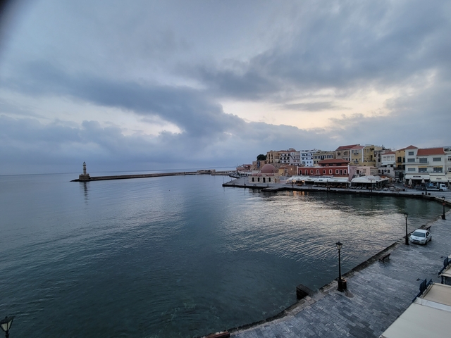 Coastal town with a picturesque harbor at dusk
