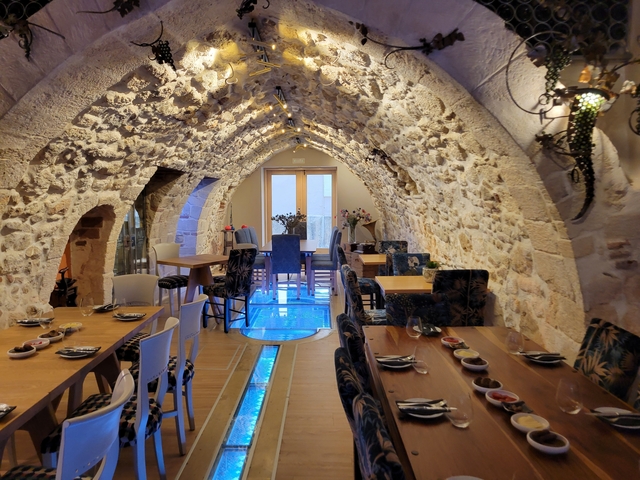 Cozy restaurant interior with stone walls