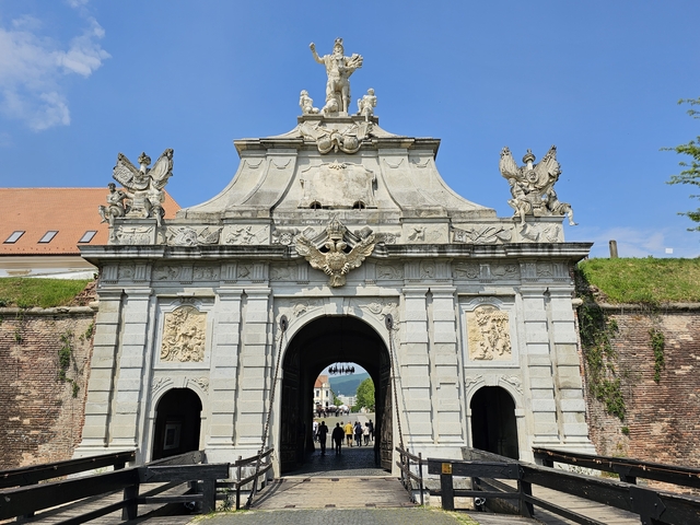 Ornate gateway entrance with historical architecture.
