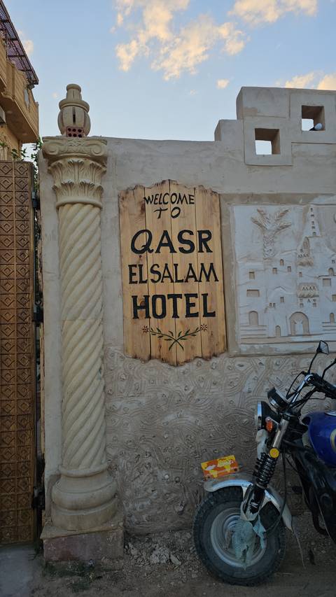Hotel signage outdoors.