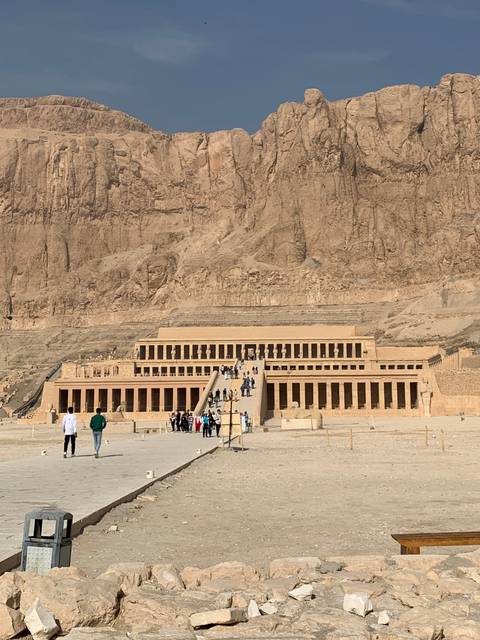 A large temple complex with visitors.