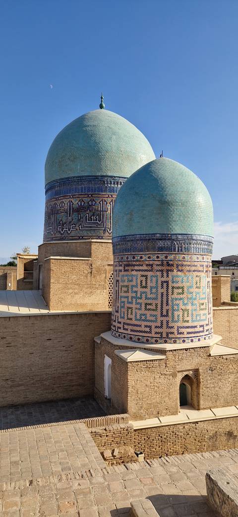 Ornate blue-domed buildings with intricate tile work
