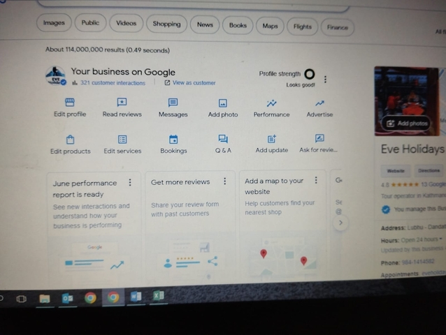 Blurry close-up of a computer screen displaying a business profile page.