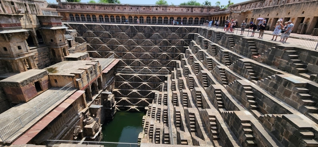 A historic stepwell with intricate designs.