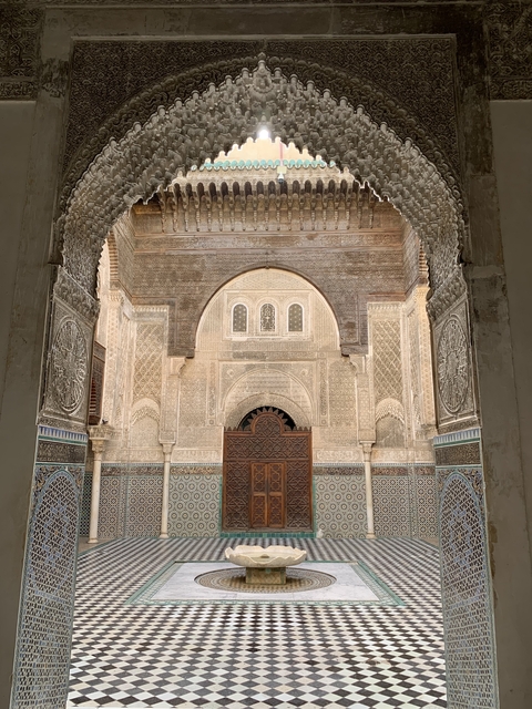 Arched entrance of a historically ornate building.