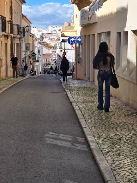 Street scene with pedestrian activity.
