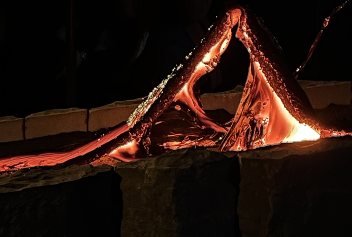 Lava flow with glowing hot surfaces.