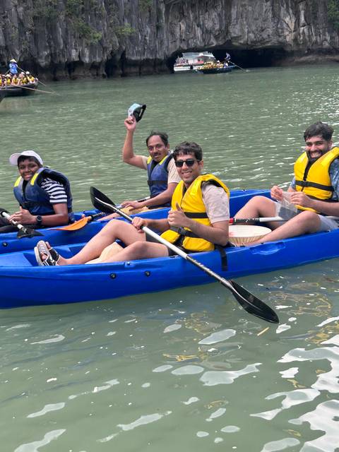 Upside-down image of people kayaking.