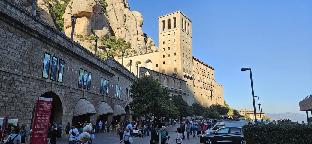 Montserrat Abbey with crowd gathered.