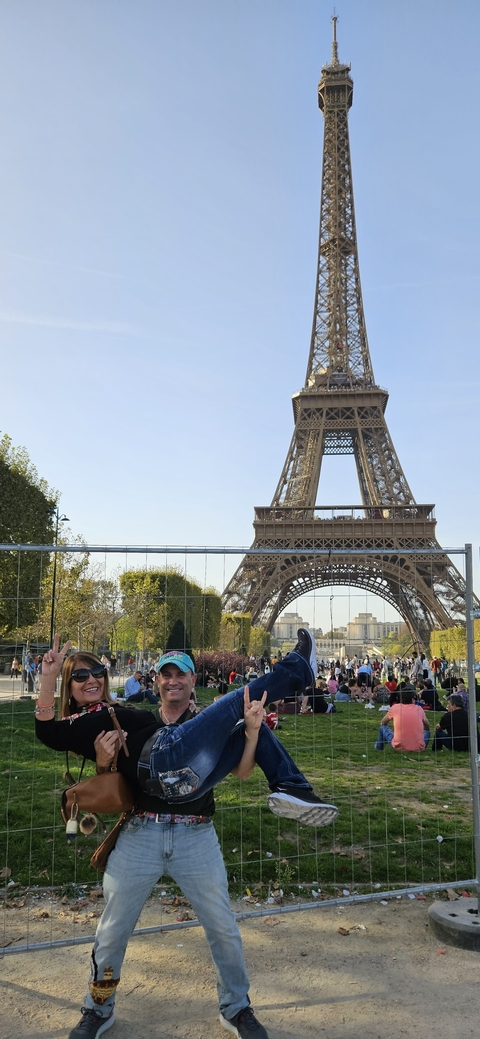 The Eiffel Tower with people in the foreground.