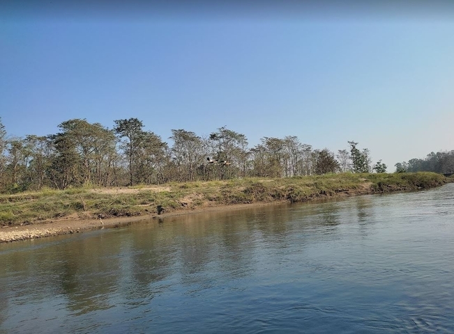River landscape with green banks.