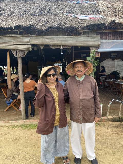 Couple wearing traditional clothing.
