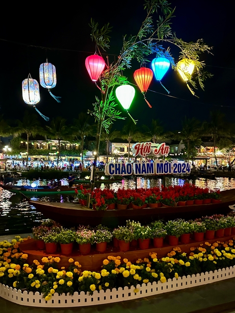 Hoi An boat float decorated with New Year greetings.