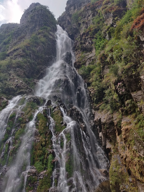 Spectacular waterfall cascading over rock face