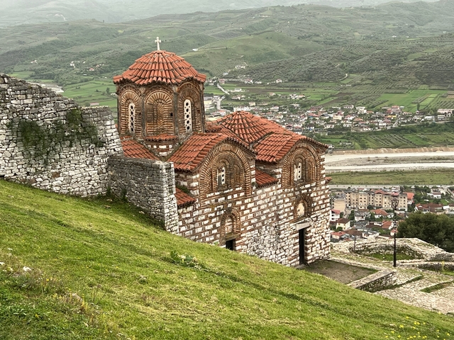 Historic church on a hillside.