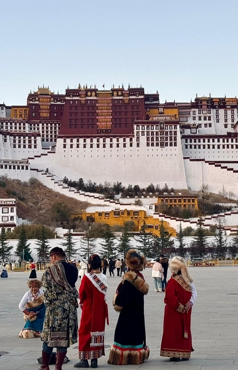 The Potala Palace standing prominently with its distinctive architecture.