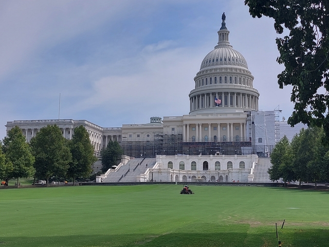 United States Capitol with the dome under renovation.