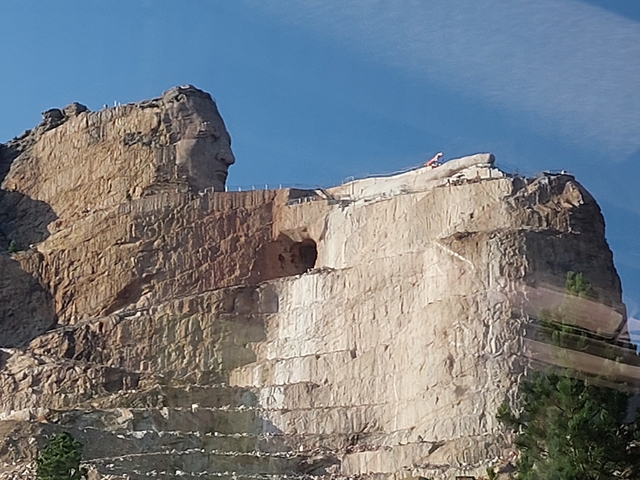 Crazy Horse memorial under construction with rock face.