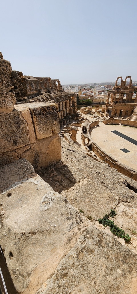 Historic amphitheater with stone seating.