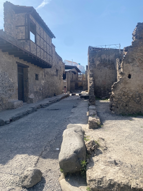 Ancient stone street with ruins from an archaeological site.
