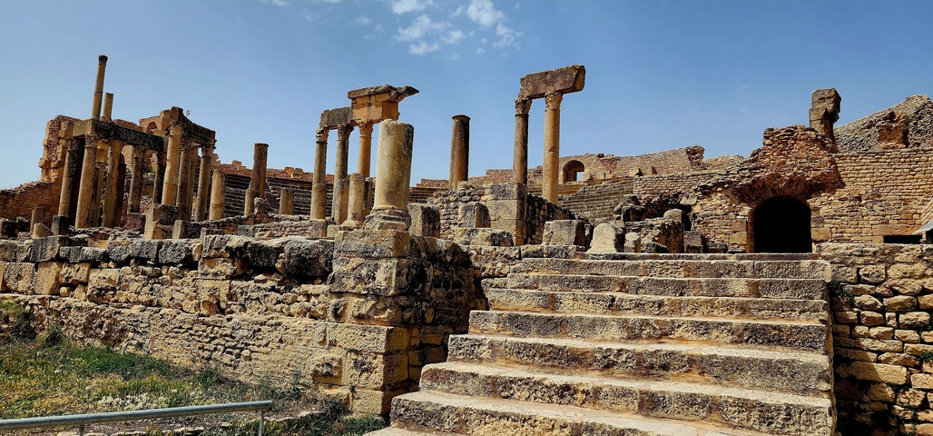 Ancient ruins with tall columns.