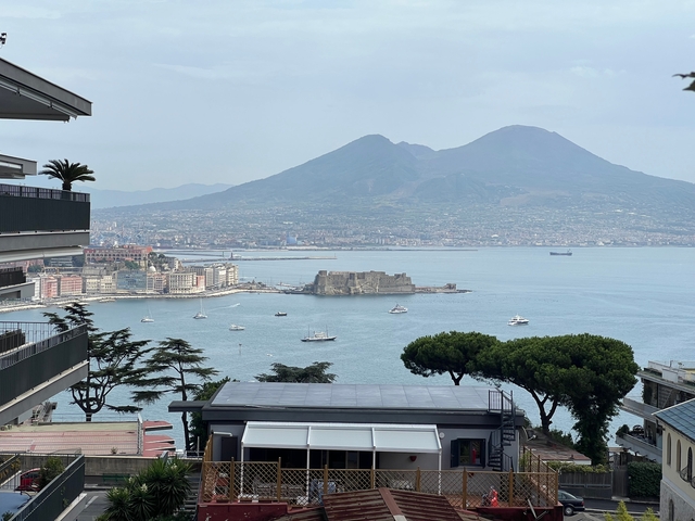 Scenic view of Naples with Mount Vesuvius in the background.