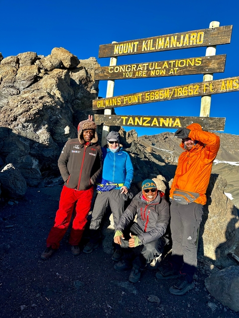 Group of people at Gilman's Point summit.