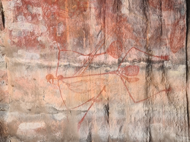 Aboriginal rock art depicting human figures.