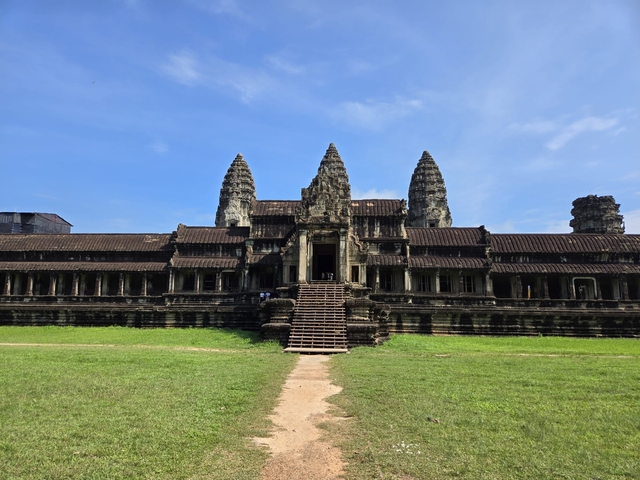 The main temple of Angkor Wat with steps and towers.