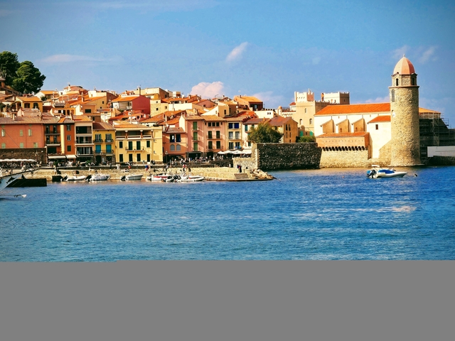 Picturesque seaside village with colorful buildings.