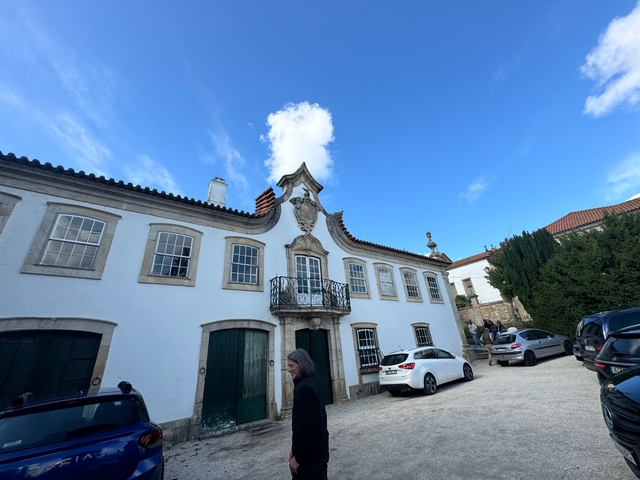 Elegant traditional house under a clear sky.