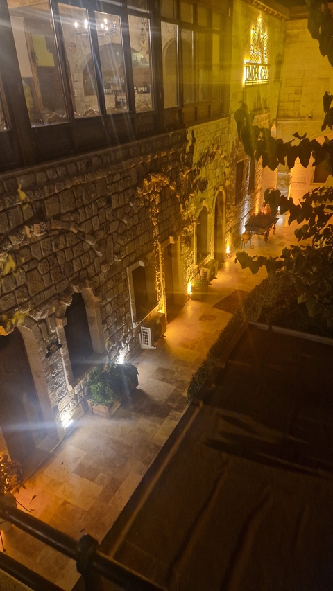 Stone building facade illuminated at night