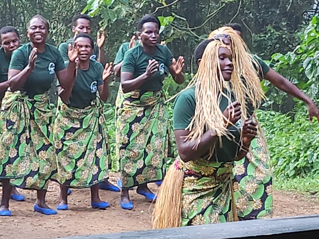 Traditional dance performance by a group in colorful outfits.