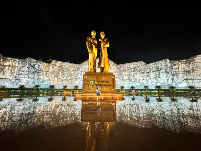 Huge monument with a reflective floor at night