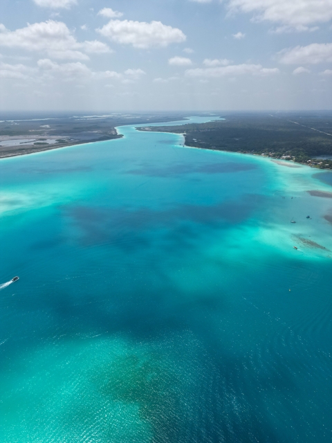 Aerial view of expansive turquoise waters.