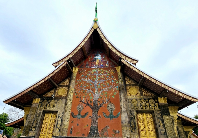 Ornate temple facade with intricate details and decorations.