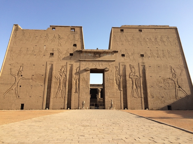 Entrance to an ancient Egyptian temple with hieroglyphics.