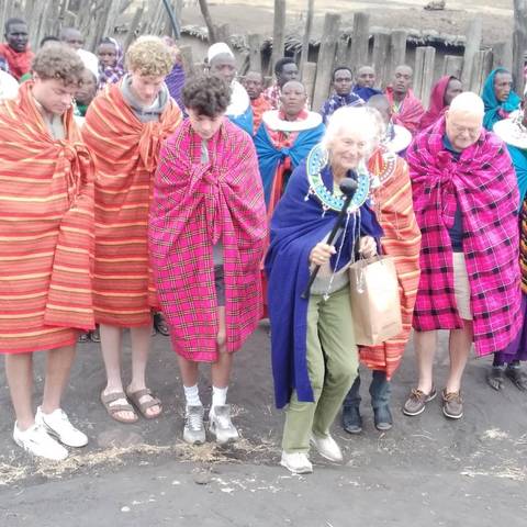People dressed in colorful traditional clothing standing together.