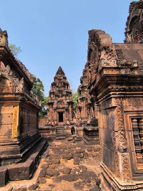 Ancient stone temple with detailed carvings and sculptures.