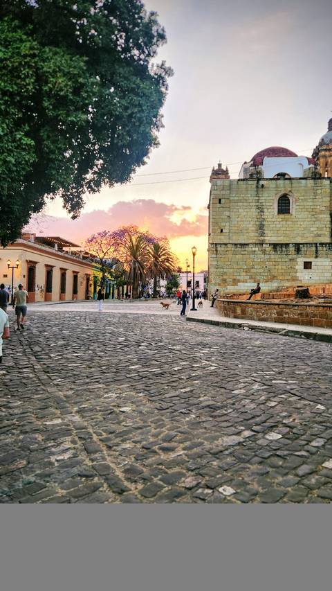 Street scene with historic architecture at sunset.
