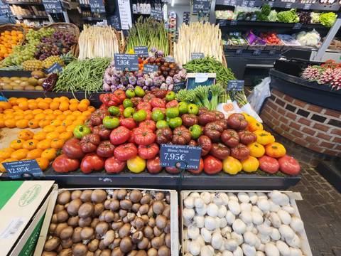 Variety of fresh produce at a market stall.
