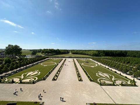 Well-manicured garden with symmetrical designs.