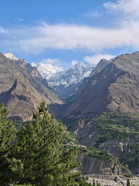 Mountainous landscape with prominent snow-covered peaks.