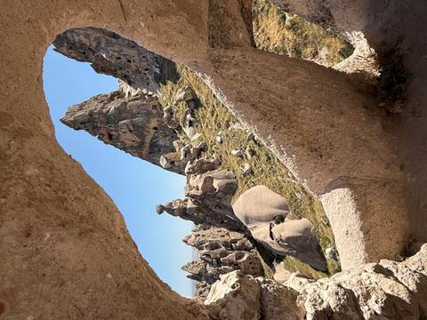 Unique rock formations viewed through a natural frame.