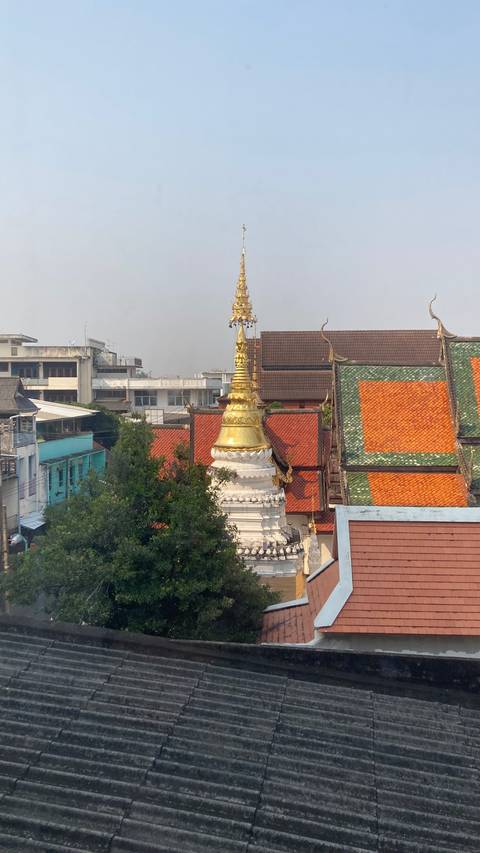 Temples viewed from above with intricate rooftops and spires.
