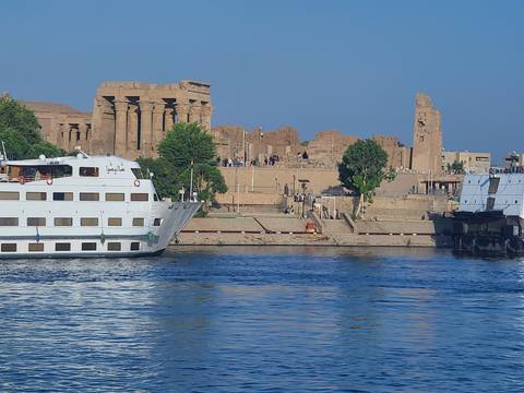 Ancient ruins with a river in the foreground.