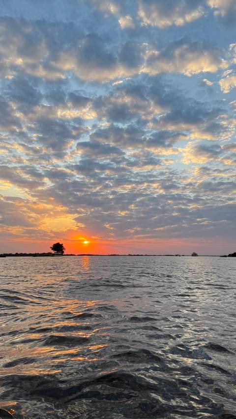 Scenic sunset over a body of water.