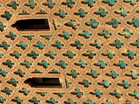 Decorative brick architecture with intricate patterns.