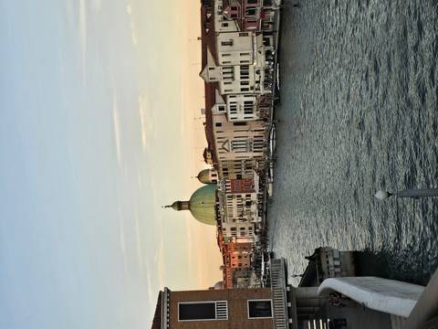 Venice's iconic canal and architecture at dusk.