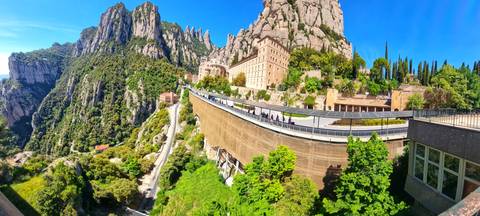 An awe-inspiring mountain landscape with monastery buildings.